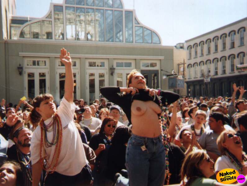 Another drunk chick feeling the need to flash her floppy tits at Mardi Gras!