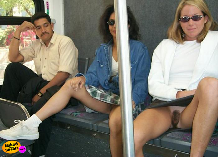 Two chicks flashing their pussies in a subway.. too hairy for my tastes