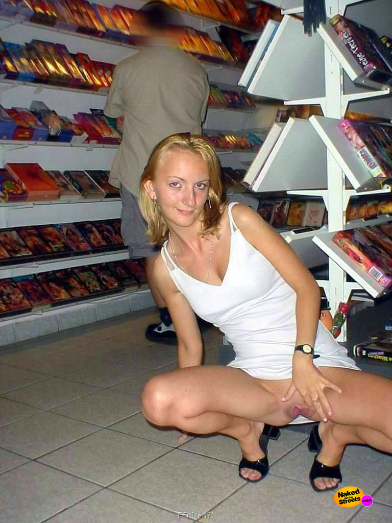 Polish chick shows snatch at shoestore