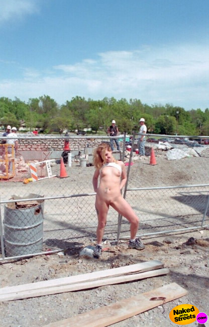Horny teen slut shows off her body at a construction site