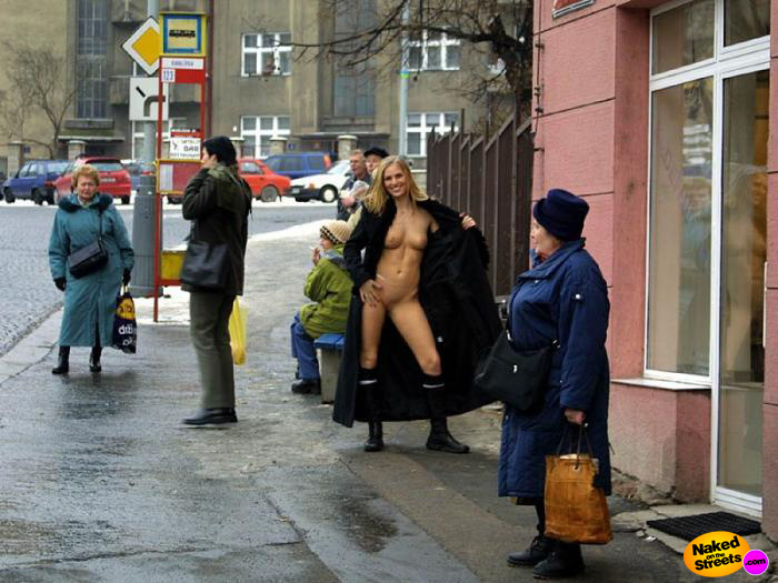 Very hot blonde chick at a bus stop showing her naked sexy body