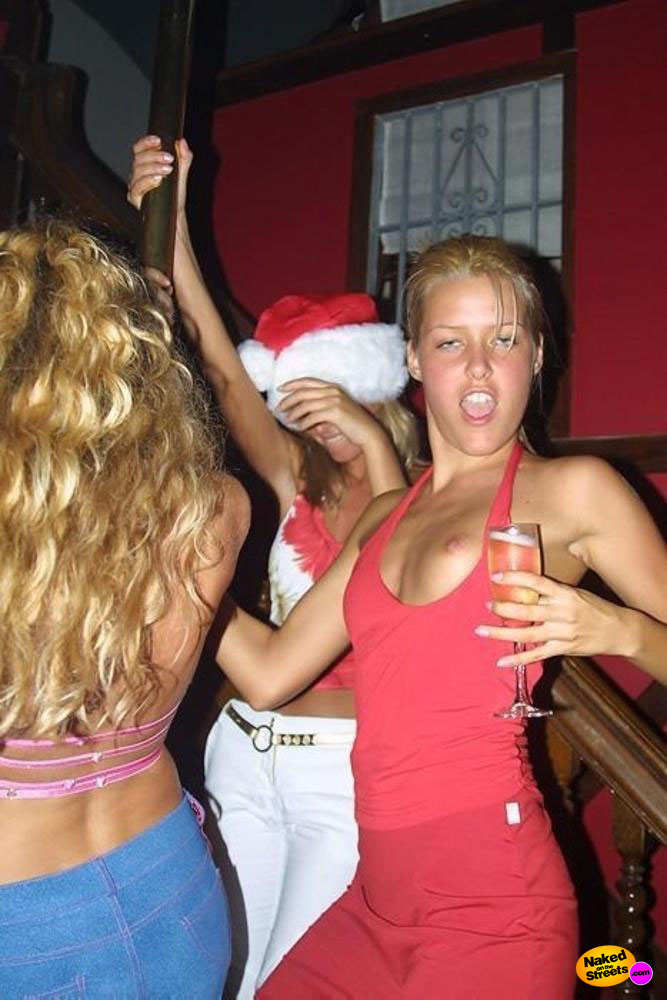 Partying drunk chick unaware her boobie is hanging out