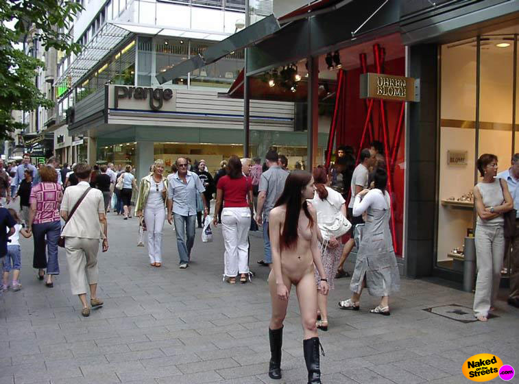 Naughty schoolgirl walks around fully nude on the streets