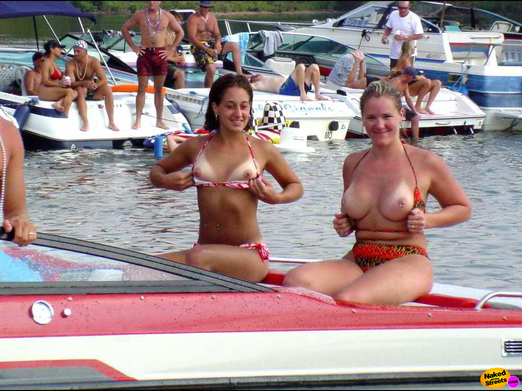 Two sexy college sluts flash their tits at a Spring Break get-together