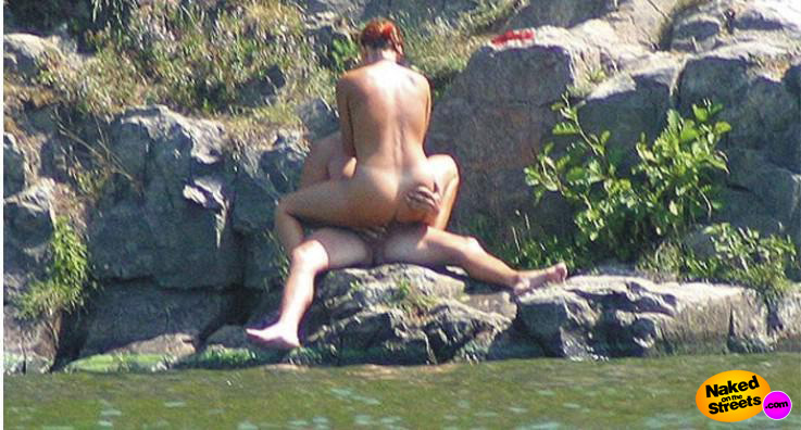 Crazy hot amateur couple getting nasty on some rocks on the river bed