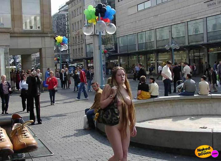 Young fat chick walking around a German shopping street fully nude