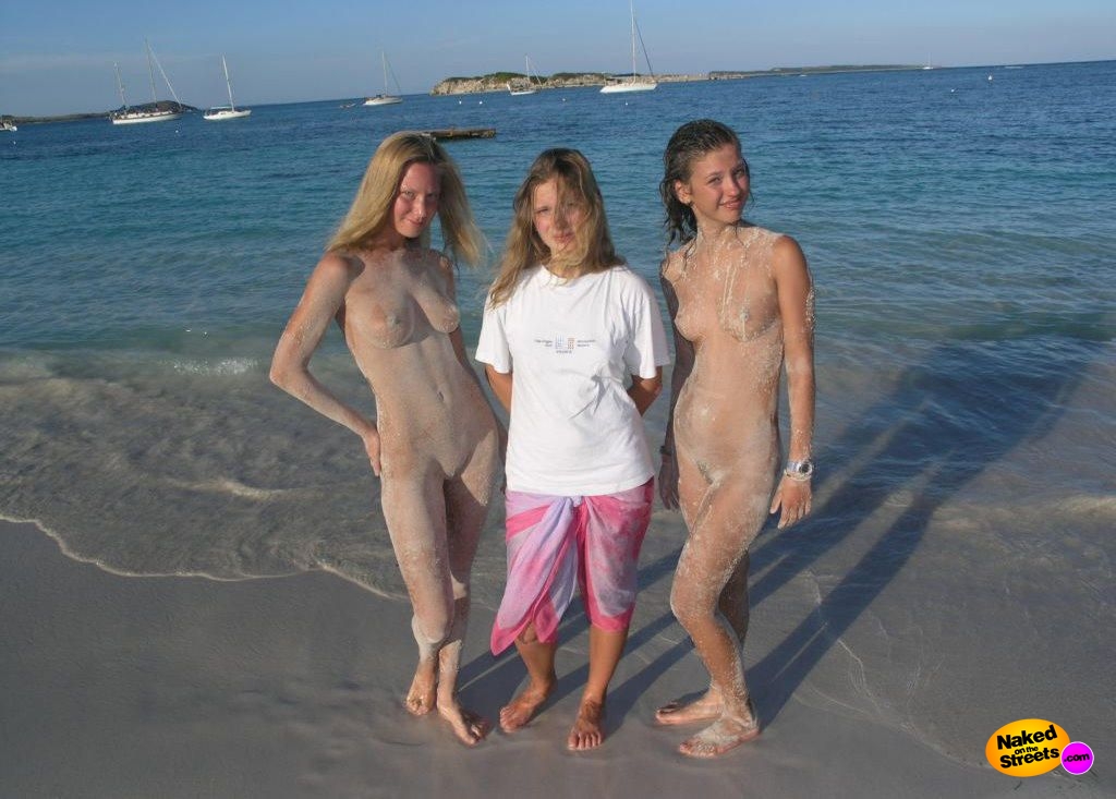 Sand covered nudist girls
