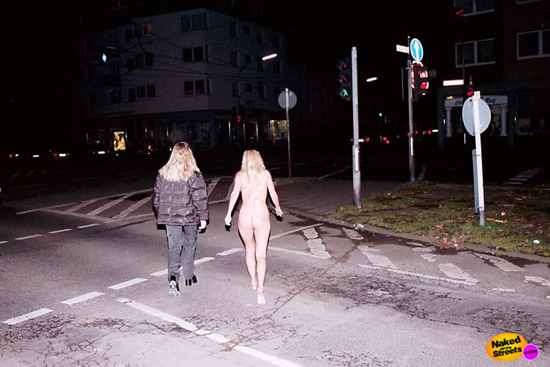 Blonde nude slut walks across town nude at nighttime