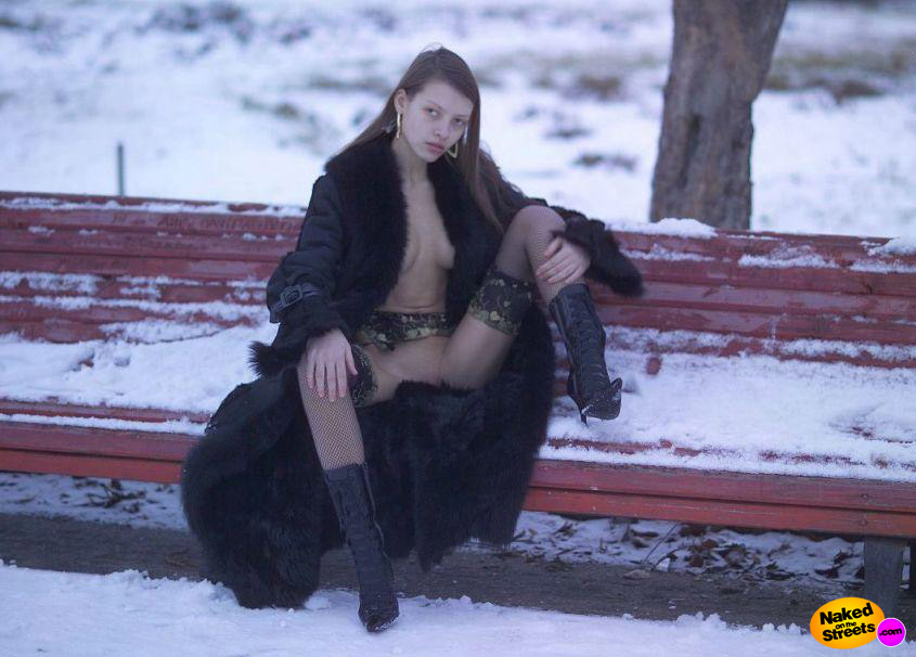 Scary looking slutty zombie flashing her tits and pussy in snowy Russia