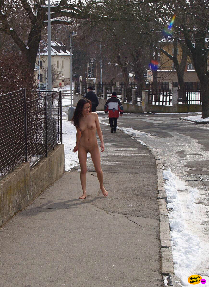 Tiny Asian hottie posing nude on the cold streets