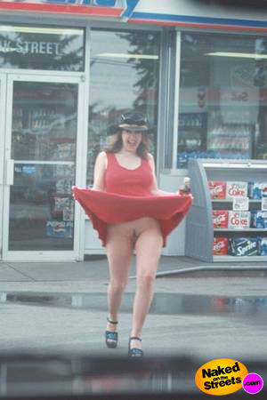 Crazy amateur flashes her pussy under her red dress outside a gas station