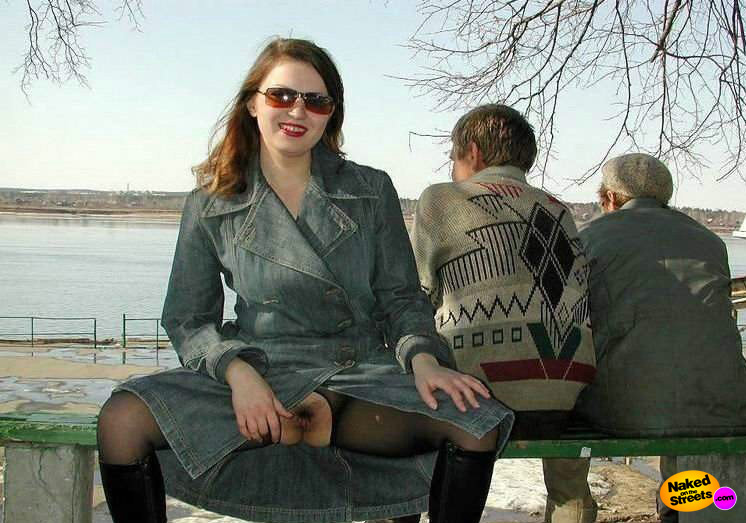 Russian whore flashes her snatch near the river