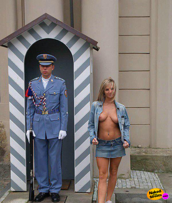 Blonde girl tries to make an English Guard move with her boobies