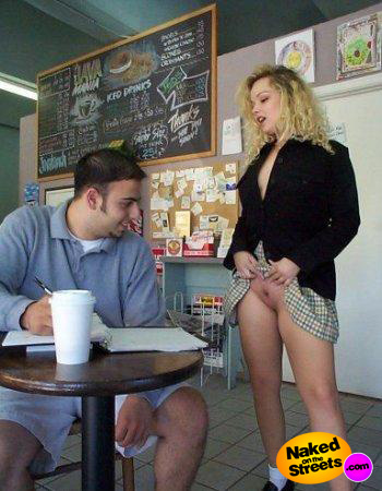 Exhibitionist chick flashing her pussy for some random guy in a coffee shop