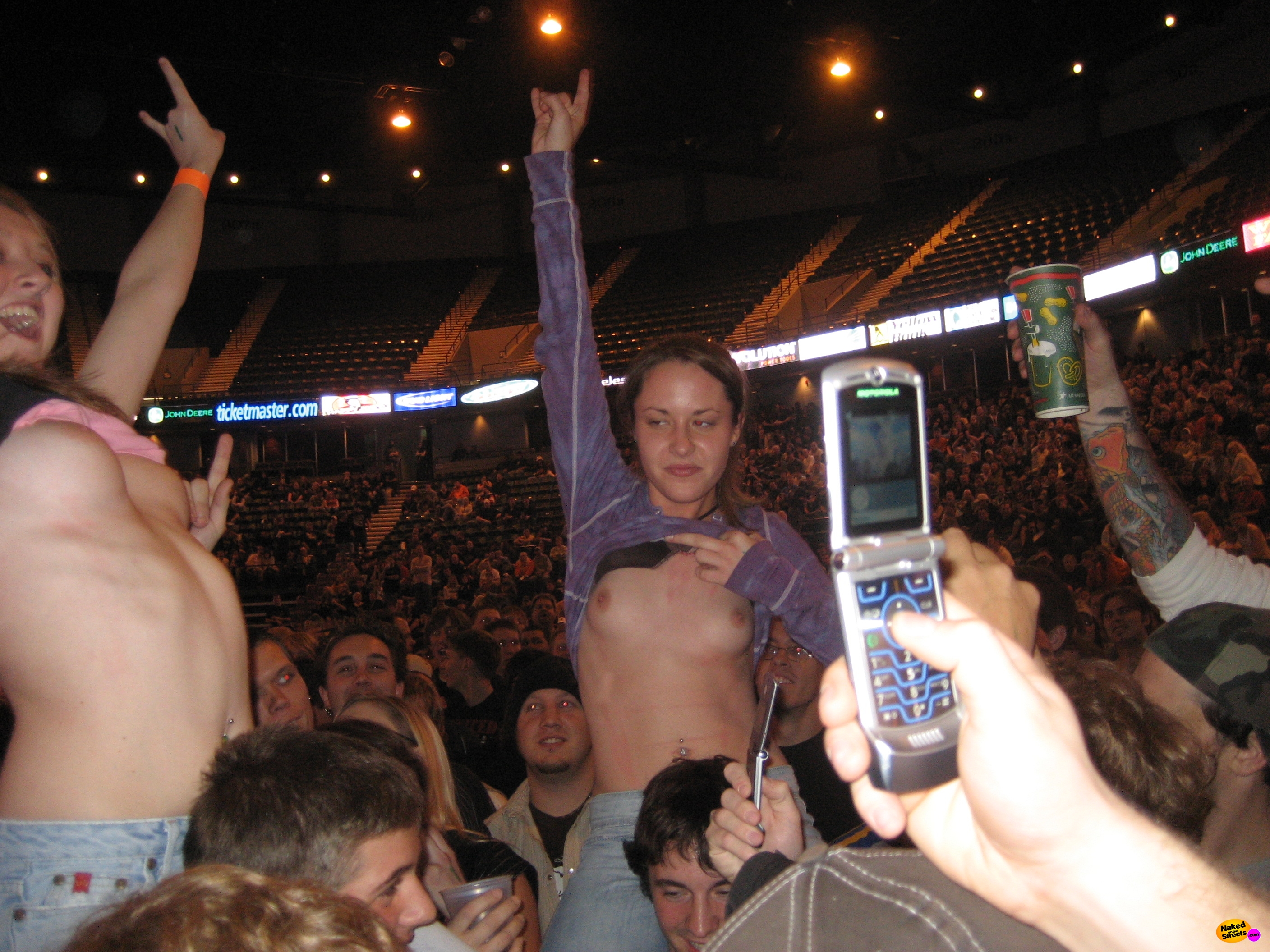 Teen sluts flashing boobs at concert