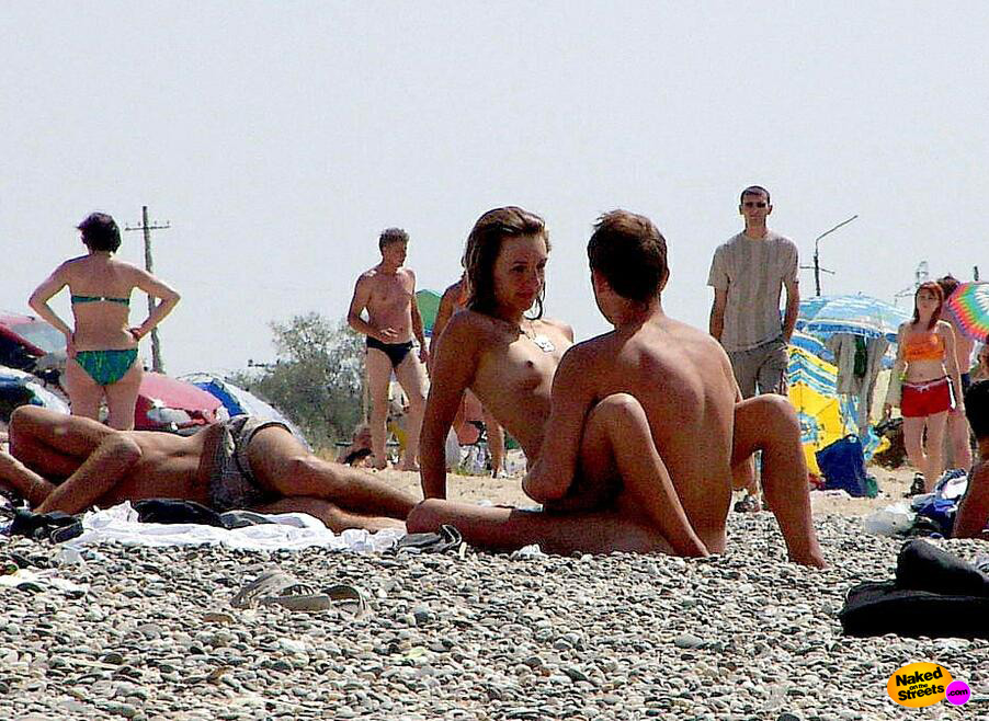 Young couple fucking on a public beach