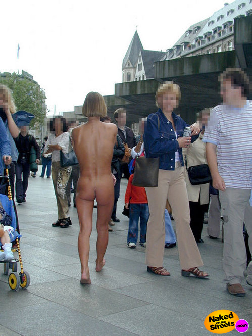 Crazy blonde milf walks the streets without any clothes on at all