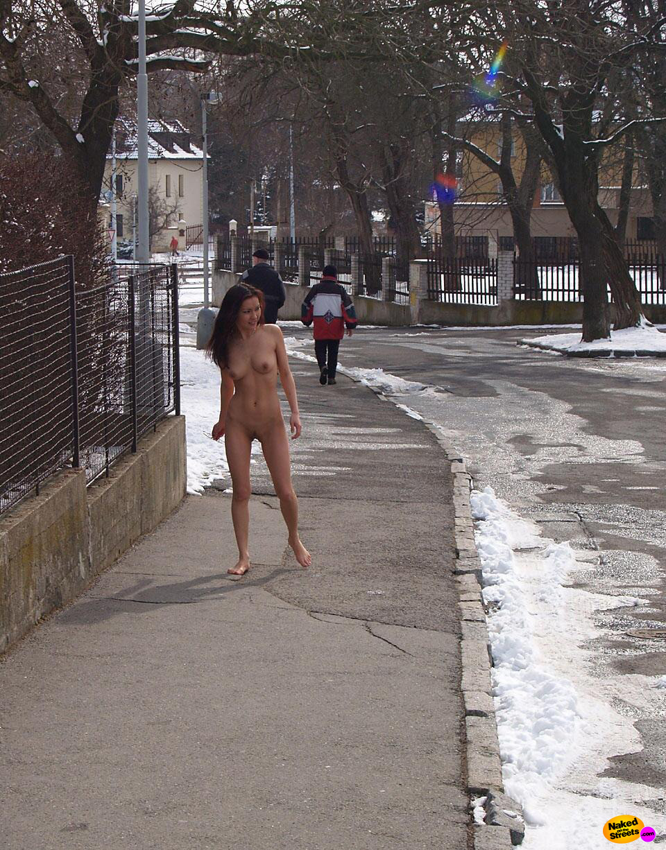 Skinny girl strips and flashes in the winter streets