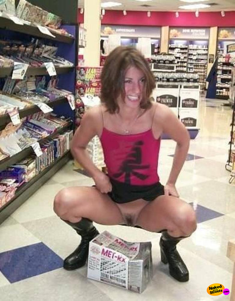Sexy girl shows her snatch in aisle 4