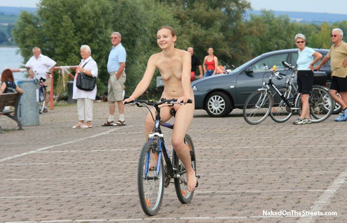 Girl goes cycling nude
