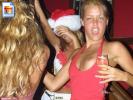 Partying drunk chick unaware her boobie is hanging out