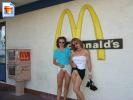 Two kinky MILFS flashing their pussies at a McDonalds Restaurant