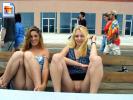 Two crazy college chicks flashing their pussies on a bench on the pier