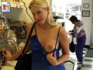 Naughty blonde chick shows off her boobie in the grocery store