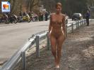 Extremely hot girl walks around naked on the street