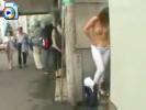 Crazy Japanese girl changes clothes in the street