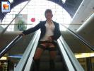 Kinky amateur shows her snatch on an escalator
