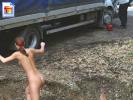 Kinky girl distracts a trucker by going streaking