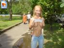 Very thin teen  girl shows her big boobs in the park