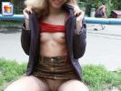 Teen slut with small tits shows her snatch in the park