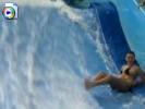 Teen girls titties slip out of bikini top in water slide