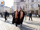 Two chicks show off their bodies in the town square