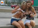 Big boobed teen amateurs show their titties on the street