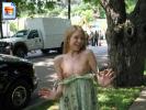 Innocent teenie flashes her boobies in public