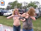 Two fugly sluts flashing their small titties for some free beer