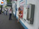 Naughty slut posing fully nude on the street