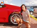 Hot chick poses next to a Ferrari.. I'd take the car!