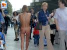 Crazy blonde milf walks the streets without any clothes on at all