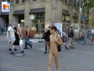 Sexy shorthaired teen walking on the streets fully nude