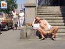 Crazy amateur slut flashing her pussy while sunbathing on the sidewalk