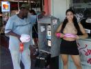 Asian girl shows off her tits at a gas station