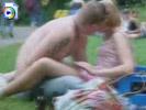 Dude fingerfucks a drugged girl during an outdoor festival.
