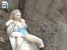 Hot blonde teen fingering her juicy pussy in the park
