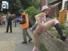 Crazy chick with a pink hat flashes her snatch, ass and tits at a bus stop