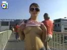 Naughty girl flashes her boobs and pussy in public