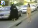 Deranged young nude girl walks through the streets of Kuwait